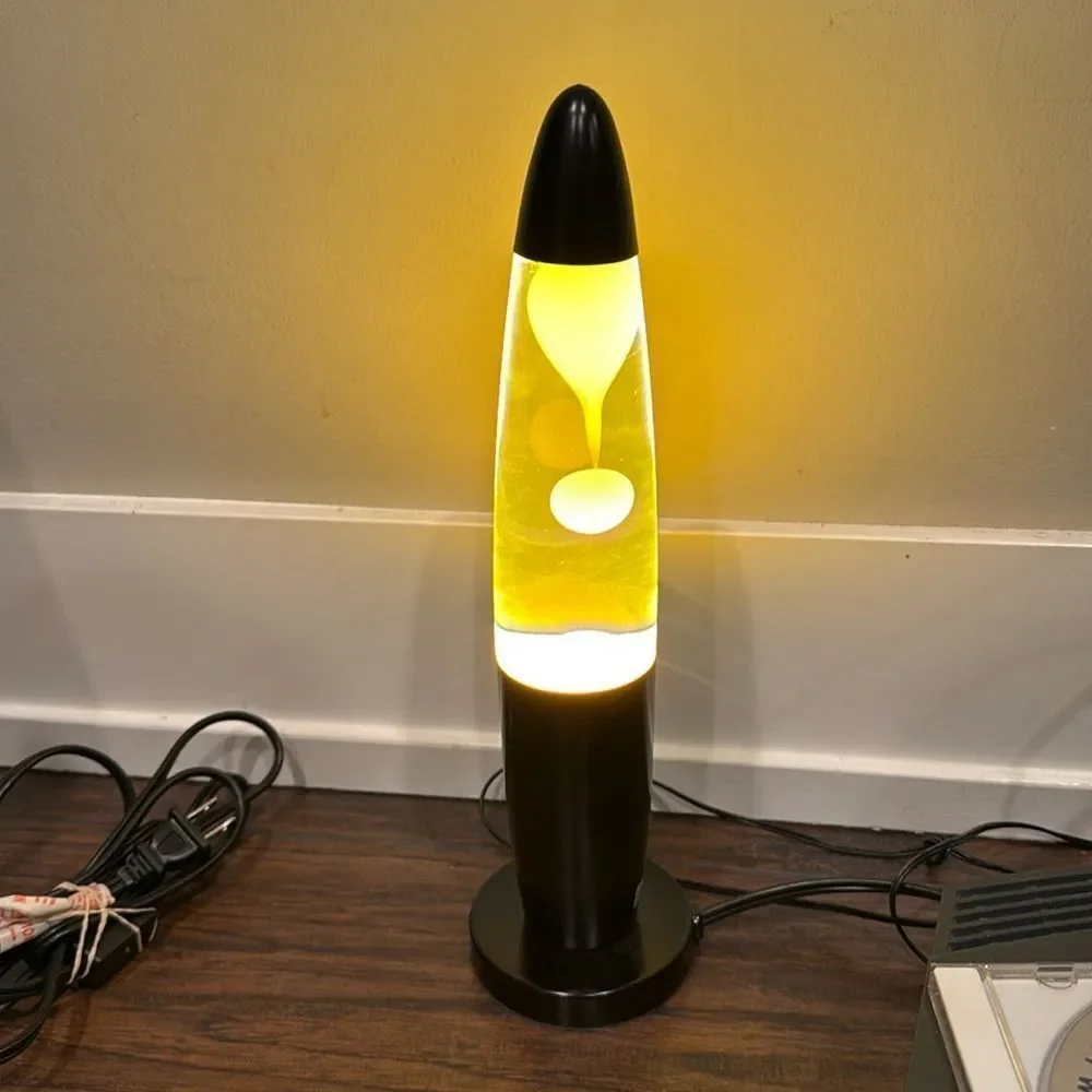 VTG black with yellow lava lamp rare rocket shape smaller perfect for desk !